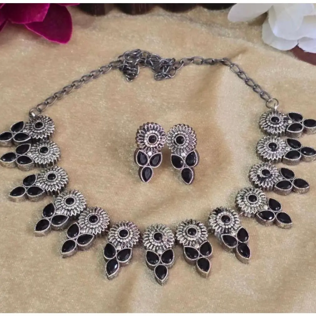 Elegant Handcrafted Necklace and Earrings Set with Floral Design and Black Stones