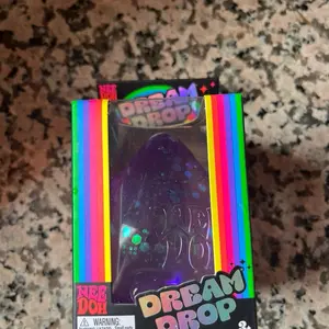 Needoh 1x single random color Glitter Dream Drop Sensory Fidget Toy for Stress Relief and Relaxation