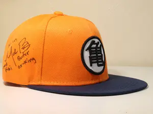 Autographed Dragonball Z Anime Baseball Cap Snapback, flat bill, Cotton Adjustable. Signed on the side by original (1st) Funimation English dub Voice Actor Mark Britten with 4 characters he voiced listed: Burter, Korin, Grand Kai, and Ox-King.