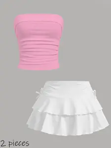 A 2-piece set of casual camisole tops and half-length skirts for teenagers, featuring simple designs that are Slim, versatile, comfortable for sports, and suitable for travel, outings, and gatherings. Teen clothing.