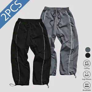 Men's lightweight, breathable,Black Contrast Piping Tr reflective printedwide-leg pants with adjustable leg openings anddrawstrings, elastic waist, casual pants suitablefor outdoor sports, fitness, campus commuting,street fashion, and versatile long pants