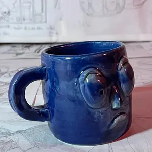Handmade face mug