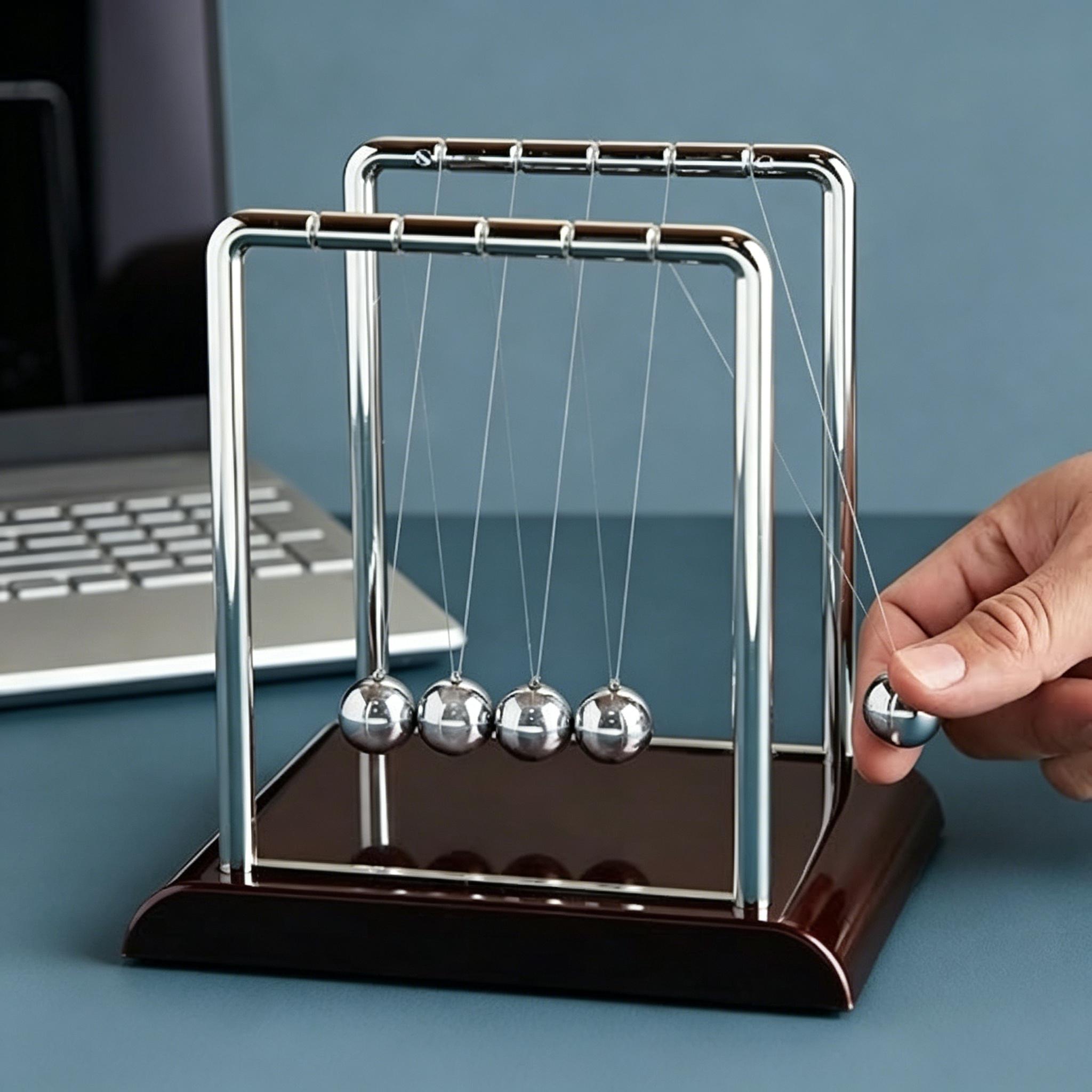 Newton's Cradle Pendulum 7x6x7 in Silver Stainless Steel, Desk Decor Stress Relief Toy, Physics Science Teacher Gift