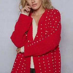 Red cable knit cardigan with pearls and gems