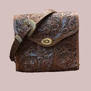 Custom Handcrafted leather bag with intricate tooling design