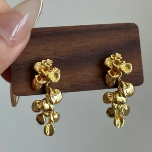 Gold Leaves Dangle Earrings - Elegant Design with Gold Finish and Leaf Motif