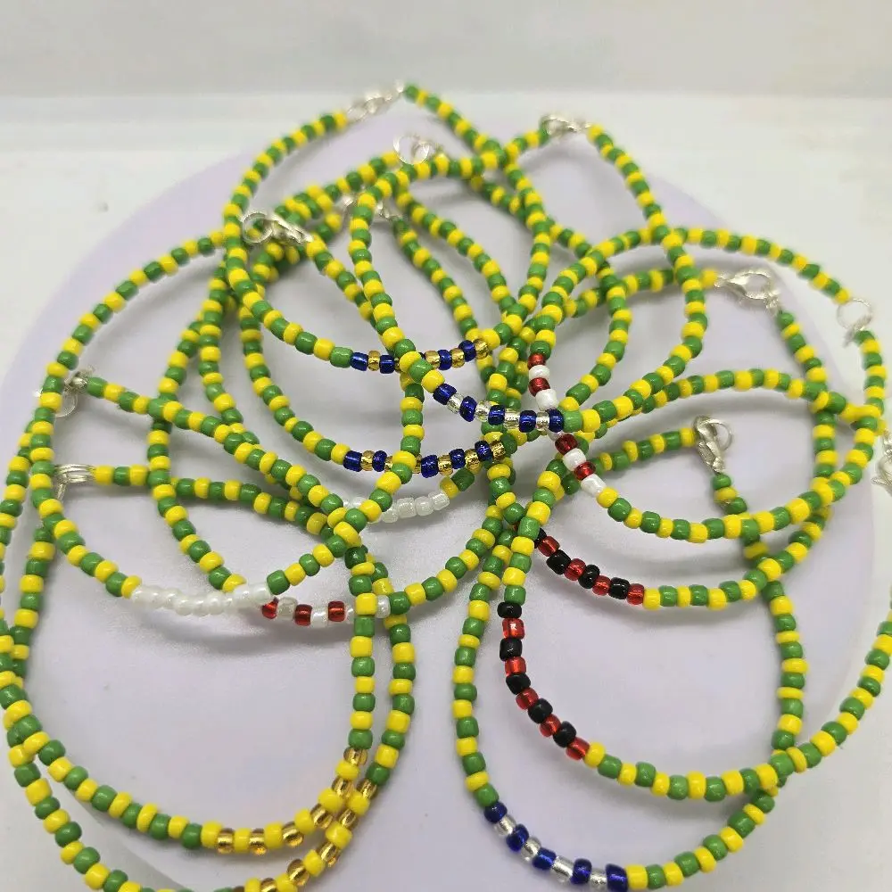 Orula Hand Bracelet with Angel Guard Charm - Green Yellow Beaded Design - Unique Accessory