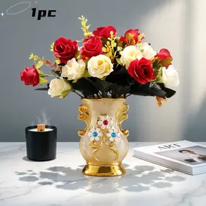 A single premium, light-luxury gold vase paired with an exquisite artificial floral arrangement offers a fantastic way to enhance the texture and feel of your space. Whether placed on a modern minimalist dining table, beside a cozy living room sofa,
