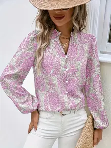 A geometric pattern V-neck long sleeve lantern sleeve shirt for women is elegant and suitable for both indoor and outdoor wear.