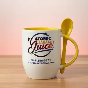 Atomiclakay Mug Cup with Yellow Handle and Atomiclakay Juice Logo - Perfect for Coffee and Tea Lovers
