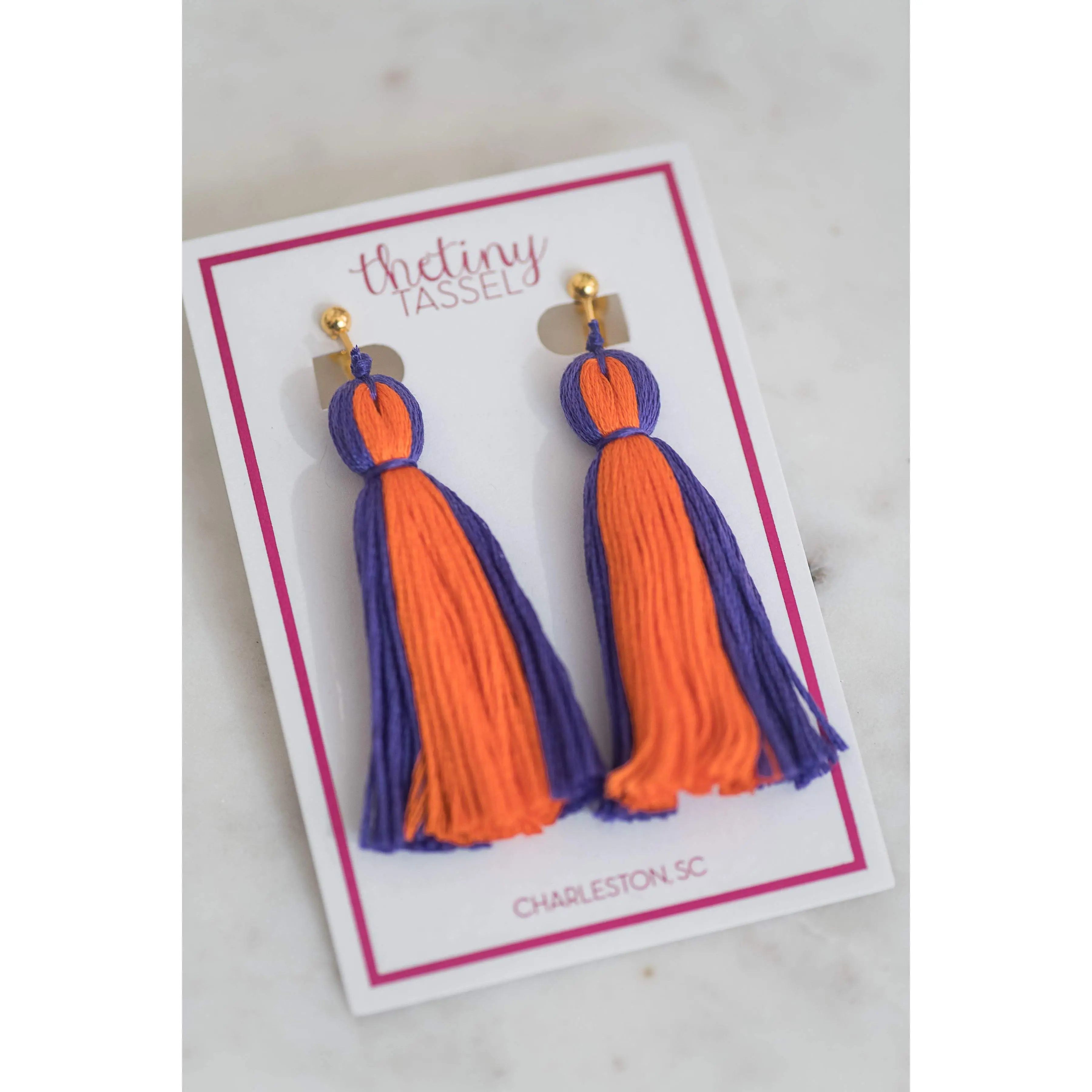 The Lilly Clip-On Tassel Earring in Dark Purple & Orange