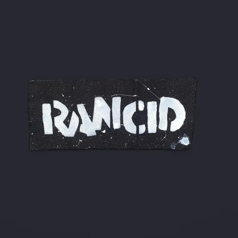 Rancid Splatter Patch Small Handmade Custom with White Text on Black Background