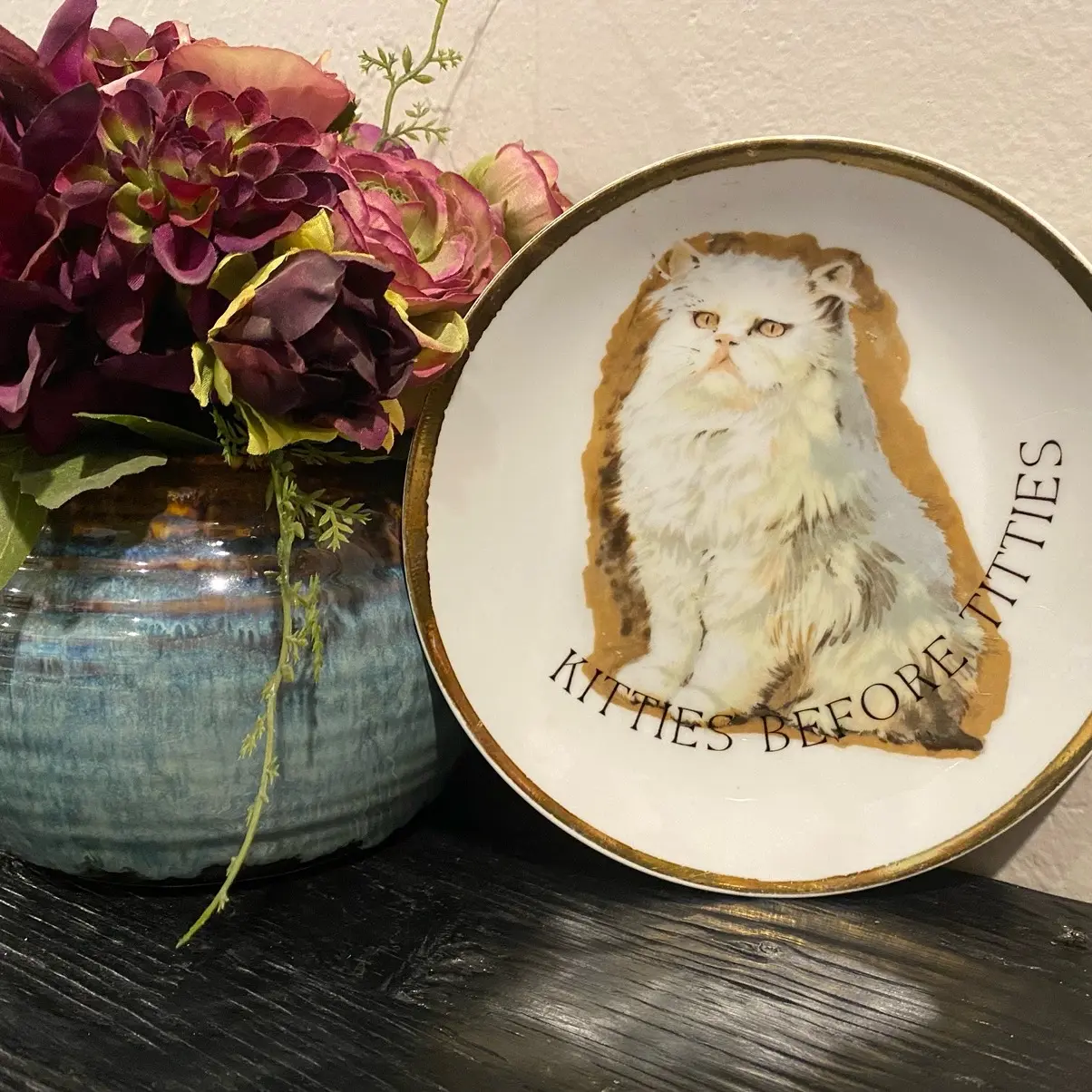 “Kitties before titties” plate