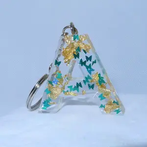 Teal Blue Butterfly and Gold Flakes Letter Key Chain