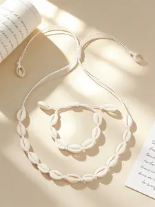 2 pieces per set, bracelet and necklace set, natural shells, hand-woven, off-white, for beach outfits, summer, beach, cool feeling, accessory, in the style of Instagram, simple, must-have for beach vacations, Bohemian shell set