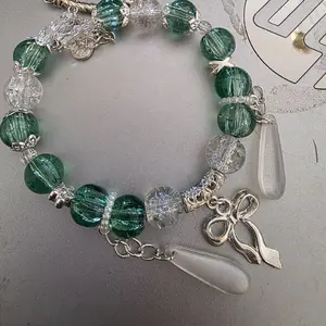 Adjustable Beaded Bracelets with Green and Clear Beads and Silver Charms