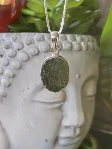 Authentic Moldavite Pendant with Necklace: A 4.8 grams genuine celestial gem, verified for authenticity. Embrace cosmic energies, deepen your spiritual connection, and leap to a transformation journey. Elevate your style and consciousness now.