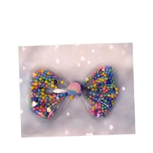 Rainbow lollipop bow