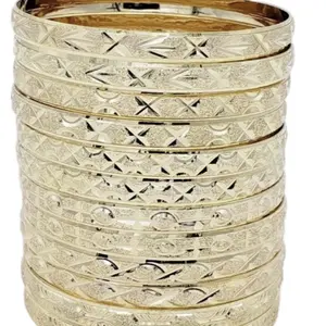 Gold Bangles - Decorative Stack with Unique Patterns and Elegant Design