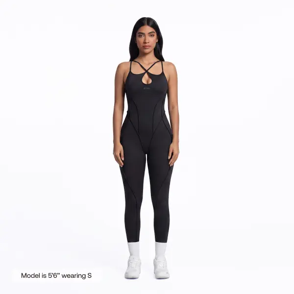 BetterMe Women's Strappy Adjustable Open-Back Cut-Out Catsuit in Black – Polyester Spandex Sculpting Jumpsuit, Romper & Overalls Fit for Gym & Everyday Womenswear