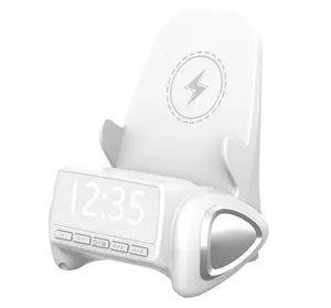 4-in-1 Wireless Charging Station with Bluetooth Speaker, Phone Stand & Digital Alarm Clock Chargeable Smartphone Device Audio