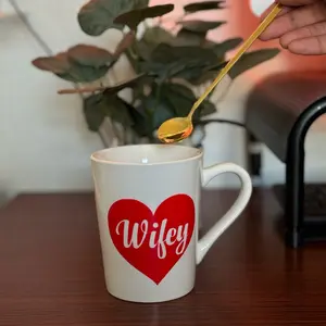 Personalized heart mug with color-changing decal, heat activated
