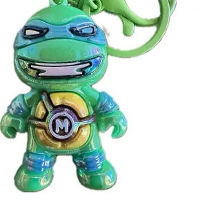 TMNT Keychains and Bag Charms - Green Turtle Design with "M" Emblem, Perfect for Fans and Collectors