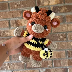 Handmade crochet rust bee highland cow plushie