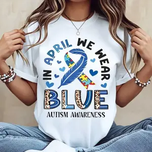 Graphic T-shirt In April We Wear Blue T-Shirt Autism Awareness Ribbon Puzzle Piece Tee for Men and Women |   TikTok viral tee, autism awareness shirt, unisex casual, coquette aesthetic, comfy everyday outfit, gift idea