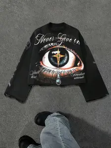Ladies' round neck black sweatshirt, trendy and fashionable, featuring a creative cartoon eye cross pattern that showcases individual attitude. The loose fit round neck style expresses self-assertion, suitable for youth culture pullovers, perfect for stud