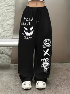 Women's Oversized Graphic Sweatpants | Y2K Streetwear Edgy Goth Punk Aesthetic High-Waisted Baggy Wide Leg Joggers - Soft Fleece Fabric with Crazy Clown Graffiti Print, XO Symbol & Bold "Bold Brave Crazy" Lettering, Drawstring Waist -