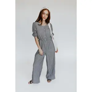 The Prowell Gingham Woven Jumpsuit in Black Multi