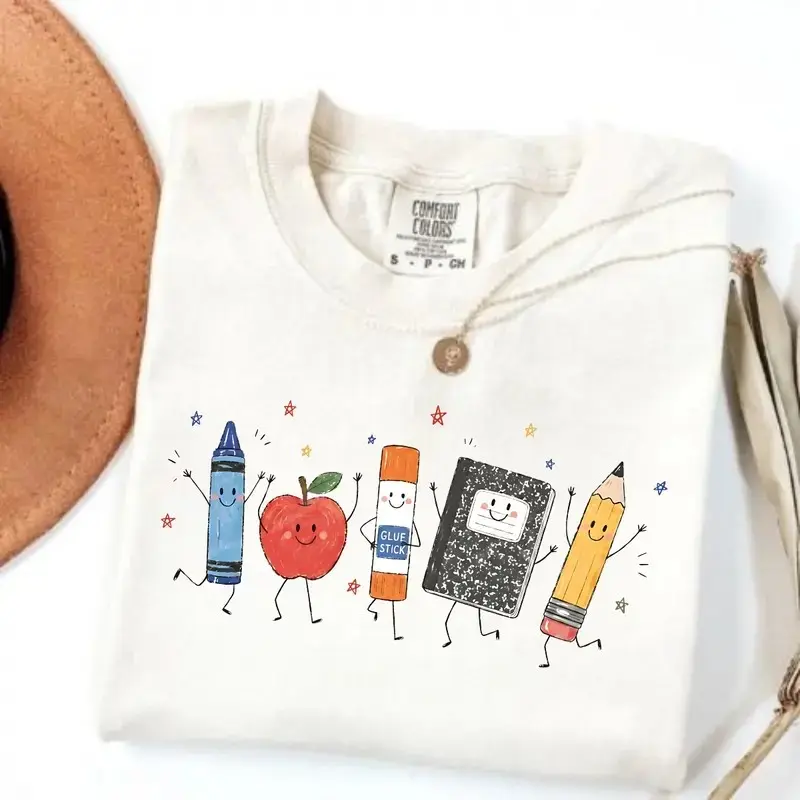Comfort Colors Cute School Supplies Heritage Graphic Tee, Aesthetic Back To School Spirit Shirt, Radiant Teacher Crayon Apple Pencil Notebook Top, Thoughtful Classroom Sublimation Gift Boutique Heritage Apparel
