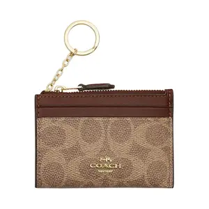 COACH Skinny ID Case 11 for Women – Logo-Embossed Metal Zip Closure, Faux Leather and Plastic Cardholder in Tan and Brown
