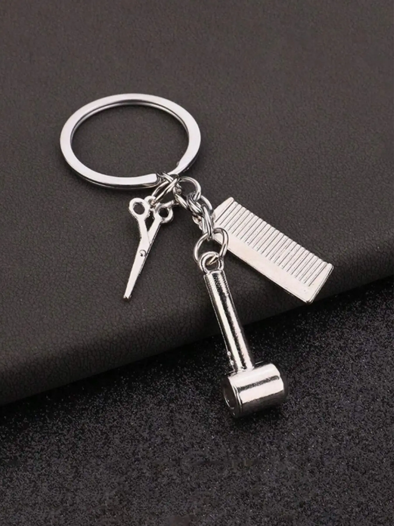 Show your barber pride! This Stylish keychain with scissors, comb, and dryer is the perfect accessory for hairstylists—great for gifts or everyday carry. Key Chain Accessories #HairstylistCharm #BarberLife #ProfessionalAccessory #GiftForStylists