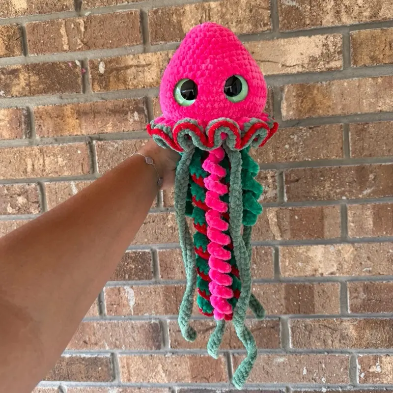 Handmade hot pink jellyfish crochet plushie