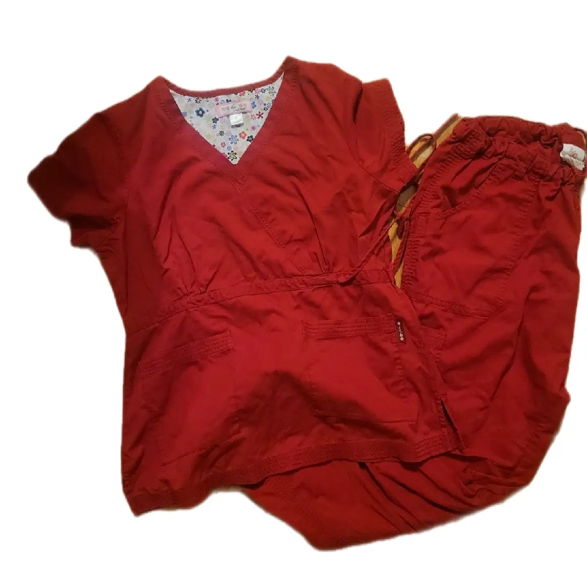 Koi scrubs.  Medium top. Large Pant. Red