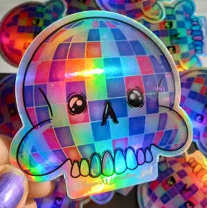 Holographic surreal disco ball skull vinyl sticker