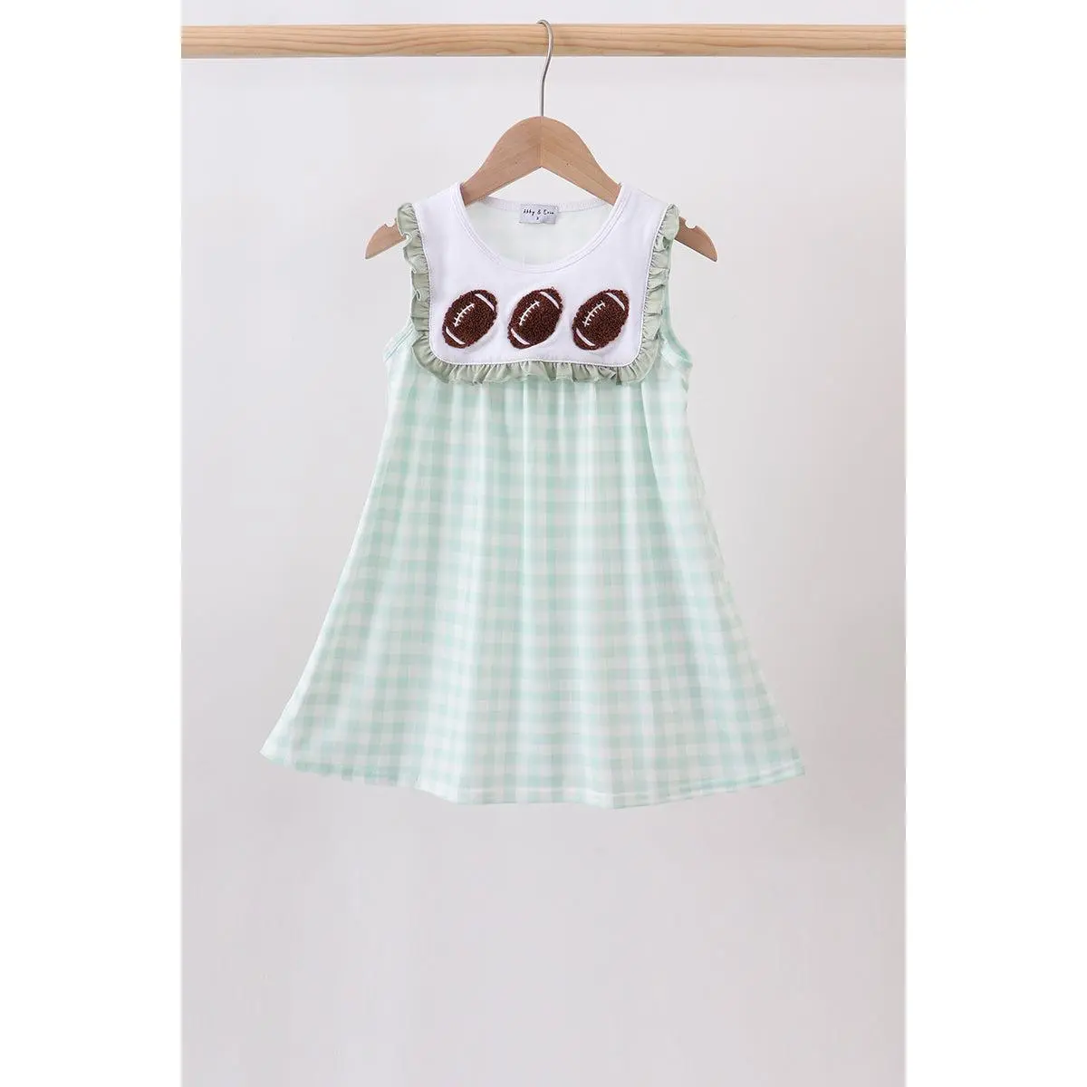 Green football french knot gingham ruffle dress