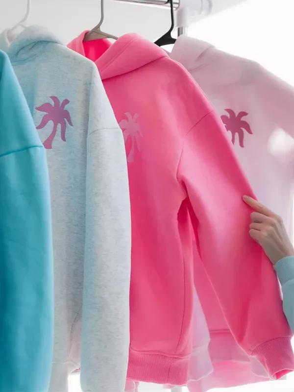 Coastal fashion: vibrant large lotus flower embroidery on the back; hooded sweatshirt made from ultra-soft fleece fabric, featuring a loose, comfortable fit that creates a relaxed beach vibe. A summer essential. Lotus flower embroidery.