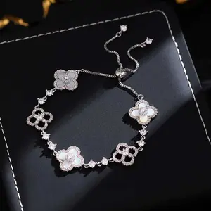 French Paris Ladies Four-Leaf Clover Bracelet with Sparkling Crystal Stones Adjustable Non-Allergic Waterproof Design Rose Color Floral Design Hypoallergenic Material bracelet for men