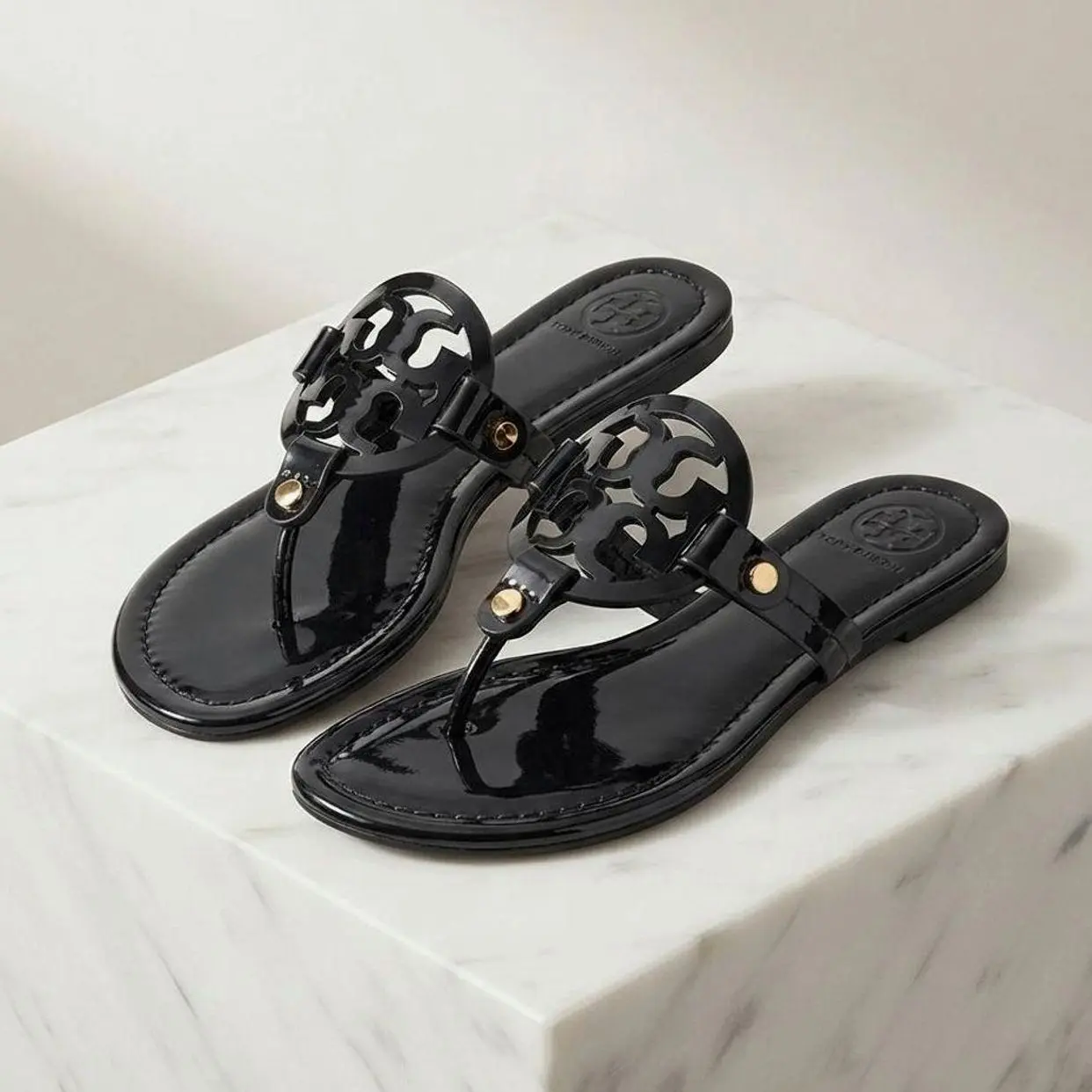 Women’s Glossy Flat Thong Footwear - Cutout Medallion T-Strap Slip-On Open Toe Casual Sandals for Summer Vacation