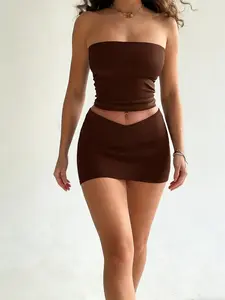 Two-piece women's tube top crop top with a cut-out high-waist bodycon mini skirt in a hot girl style, Casual, combining sexy cuts with a sleek texture, Perfect for social occasions such as clubbing, themed pa