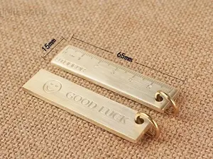 Includes shipping cost: 6 cm small brass ruler, pure brass portable metal straight ruler, retro keychain, ID tag pendant, thickened smiley face design