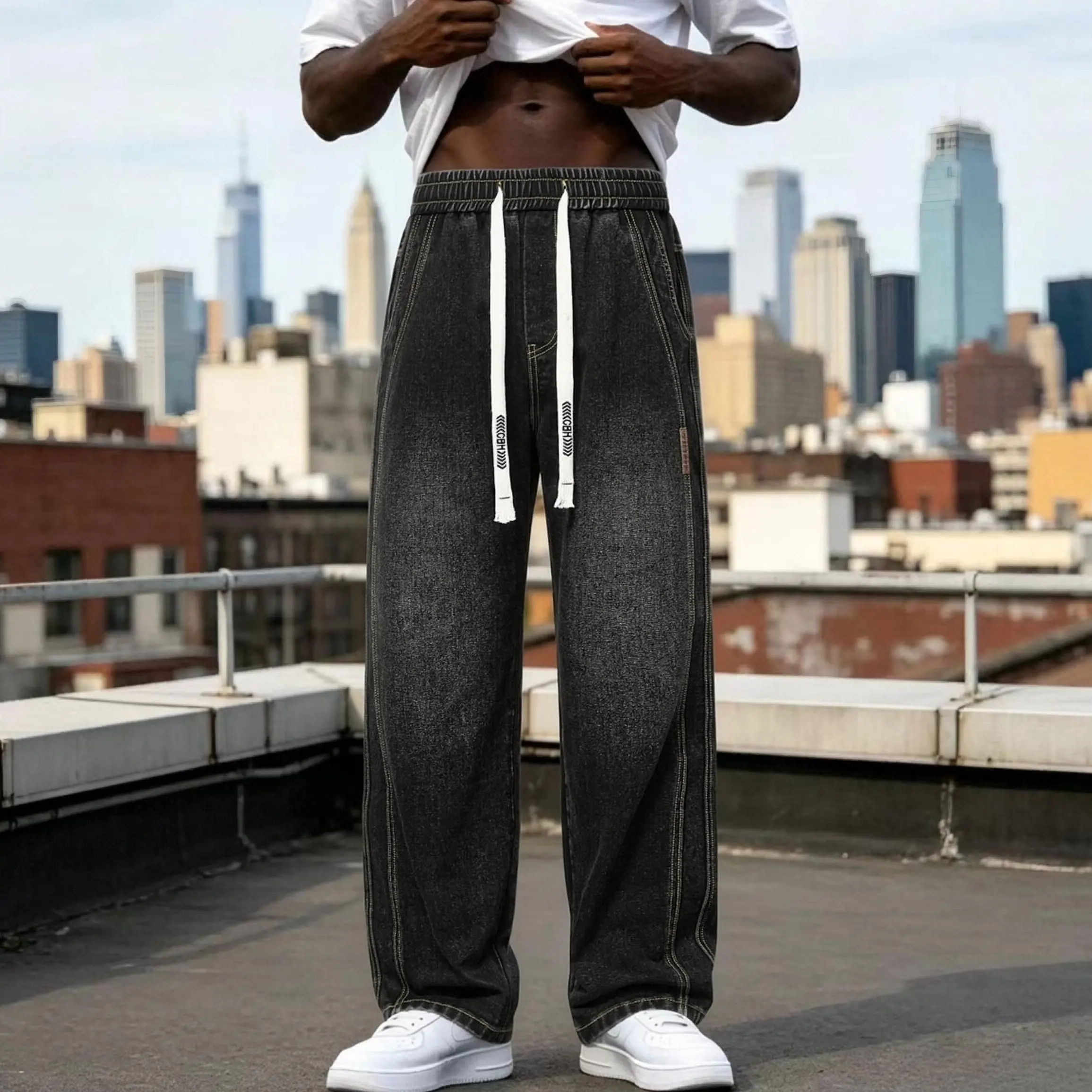 Summer lightweight American retro high-street men’s jeans — washed distressed finish, stylish and versatile solid color, minimalist loose straight cut, casual commuter style, drawstring tie detail, basic design, available in multiple colors
