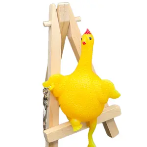 Squeazable Rubber Chicken Egg Laying Keychain - Fun Yellow Toy for Stress Relief and Key Organization