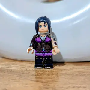 Arcane Minifigures with Vibrant Blue Hair and Detailed Abs Design No Keychains Included