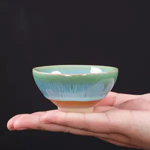 Handmade Blue-and-White Porcelain Jianzhan Tea Cup Size 3 with Gradual Light to Deep Sea Blue Glaze and Peacock Feather Inner Wall Elegant Kiln Transformation