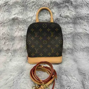 Pre-owned Louis Vuitton pvc Backpacks Alma Monogram Backpack XiaoTang0044
