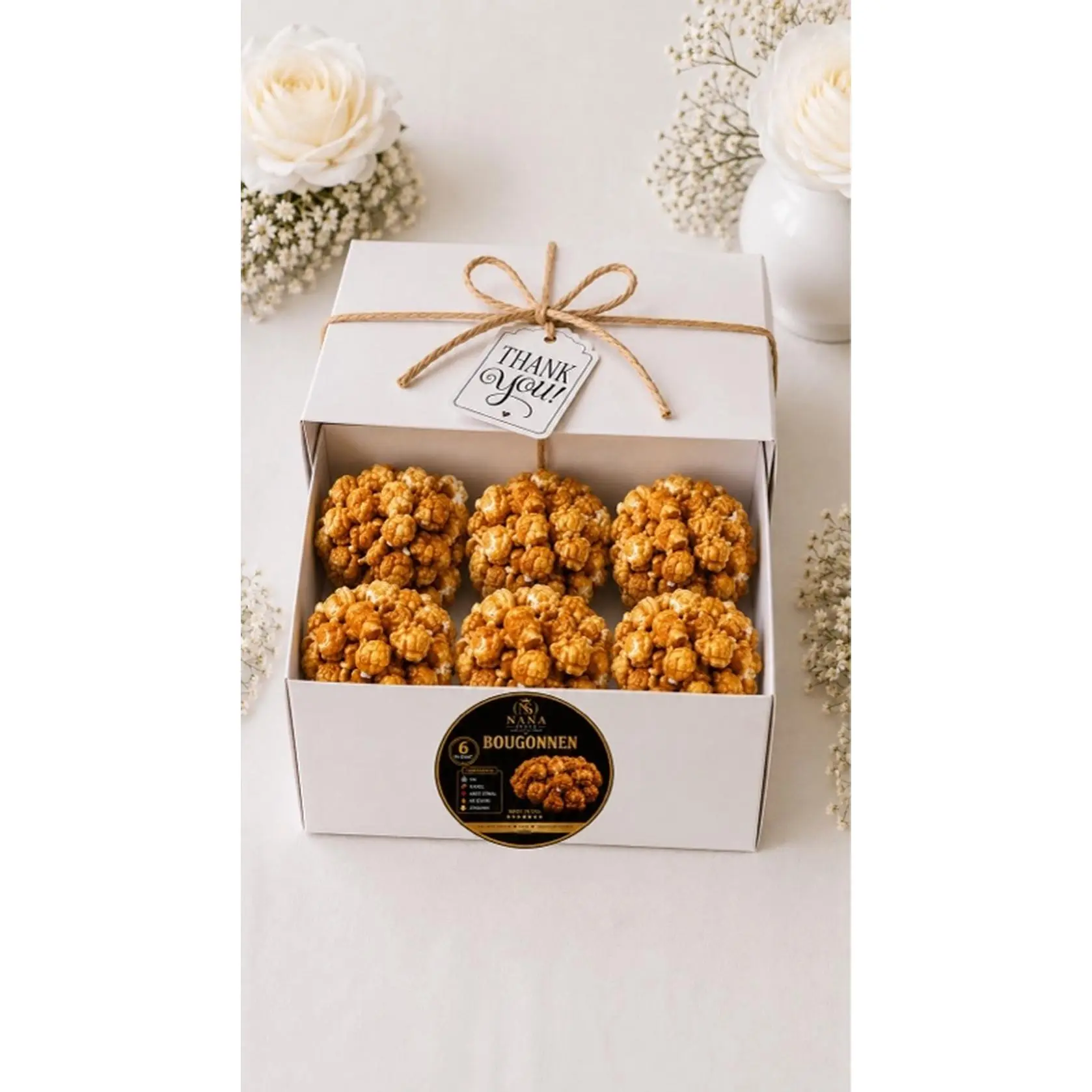 Haitian Bougonnen/caramel popcorn Ball.